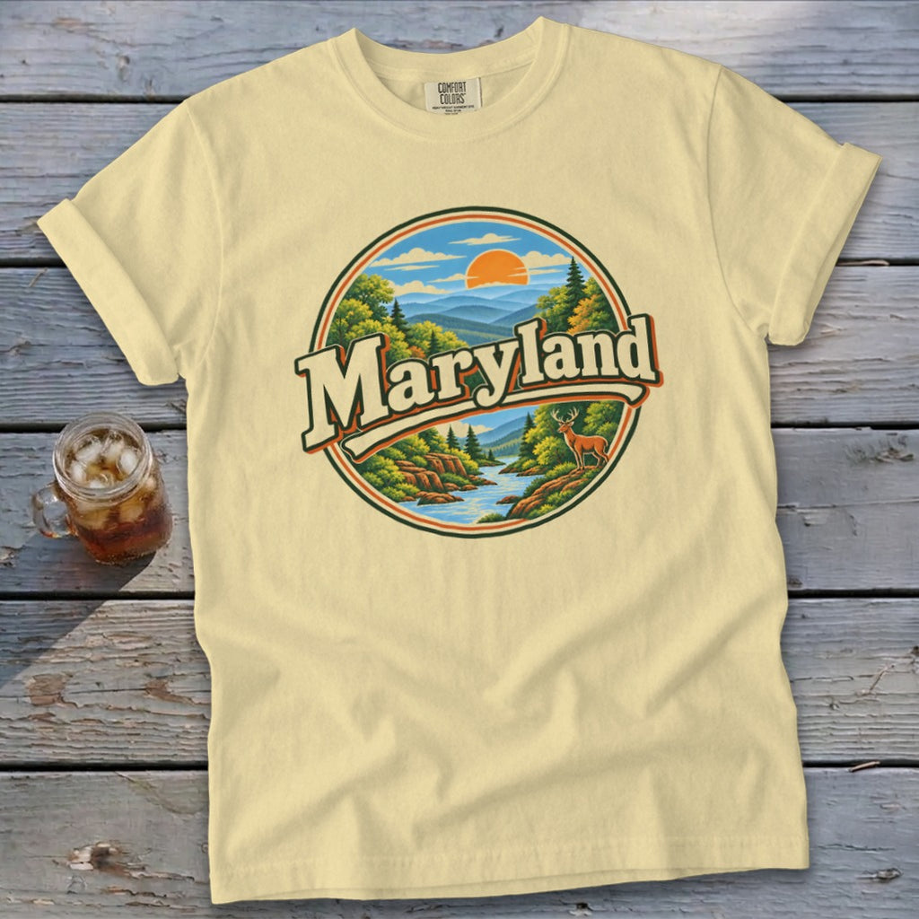 Yellow t-shirt with circular Maryland landscape graphic featuring a river and deer.