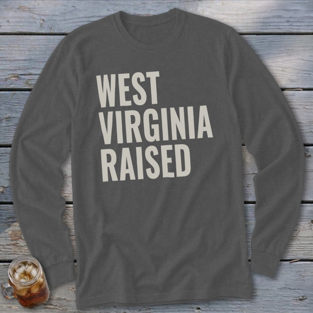 Long sleeve shirt with "WEST VIRGINIA RAISED" text in cream.