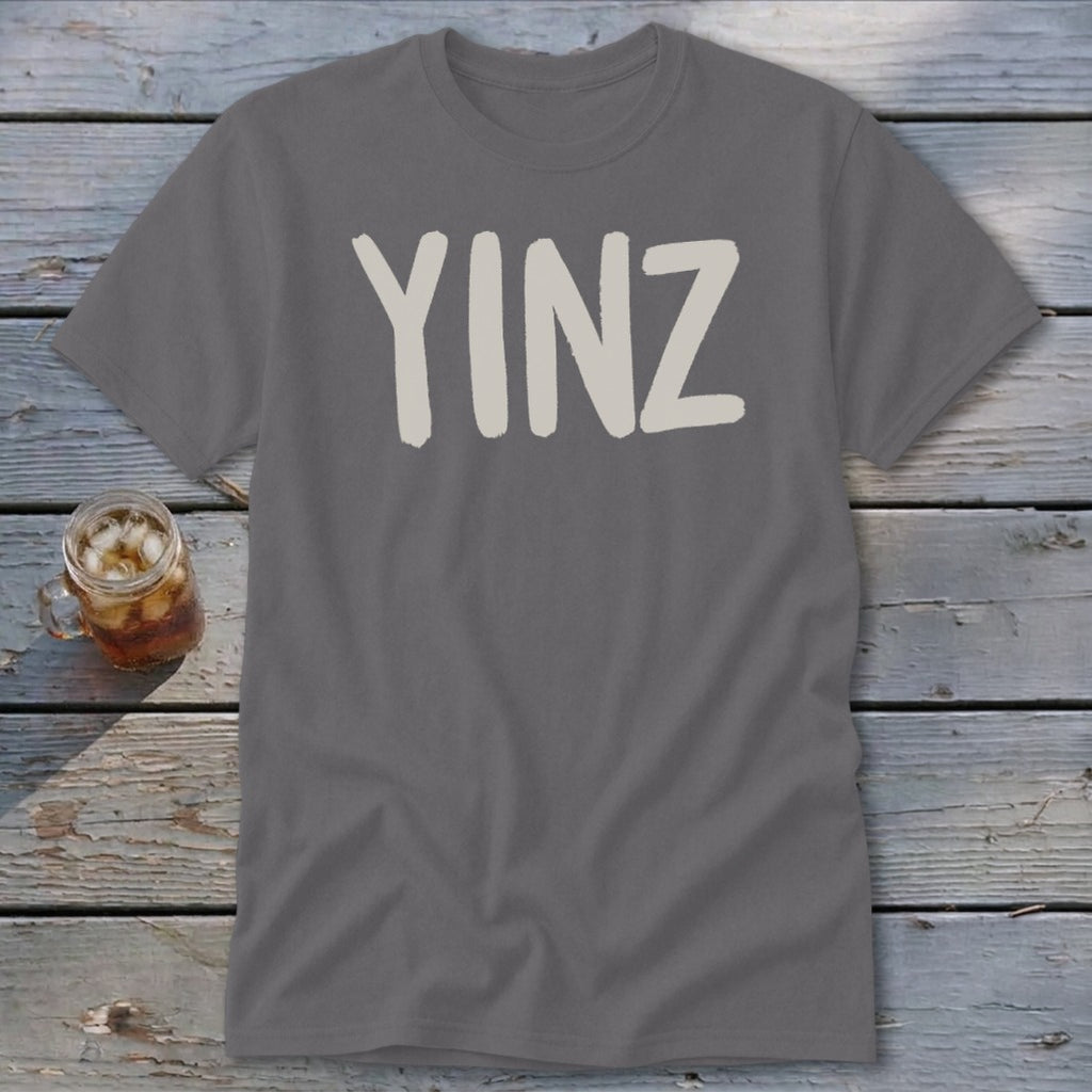 Gray t-shirt with "YINZ" in large, light-colored block letters.