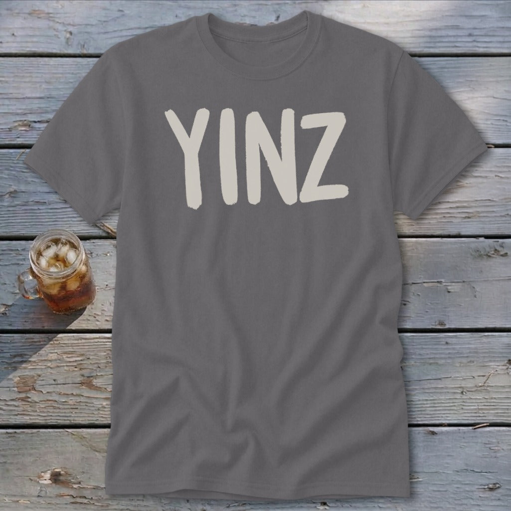 Gray t-shirt with "YINZ" in large, light-colored block letters.