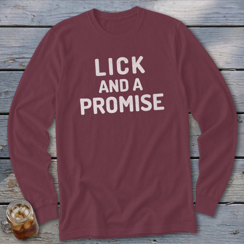 Maroon long-sleeve shirt with white text "LICK AND A PROMISE".