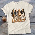 Cream t-shirt with four howling dogs and "holler" text.