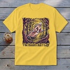 Yellow t-shirt with a ghost in a spooky forest and text that reads "The Haints Ain't Left."