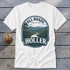 White t-shirt with "All Roads Lead to the Holler" text and mountain road graphic.