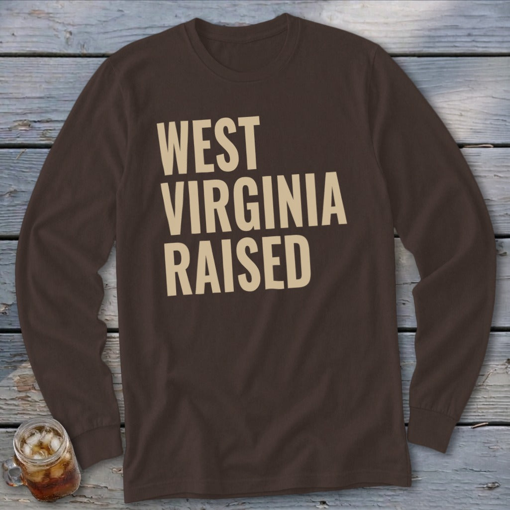 Brown long sleeve shirt with "WEST VIRGINIA RAISED" text in cream.