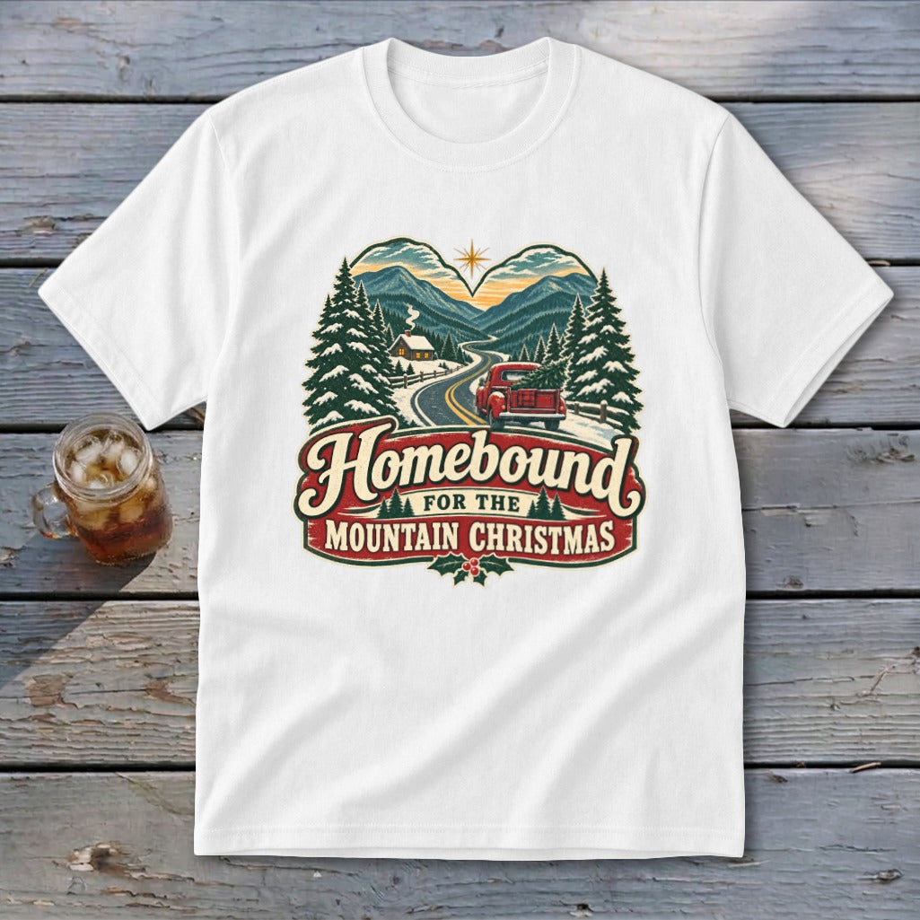 White t-shirt with "Homebound for the Mountain Christmas" graphic.