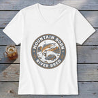 White t-shirt with circular graphic of fish jumping from river, text "Mountain Born River Bred".