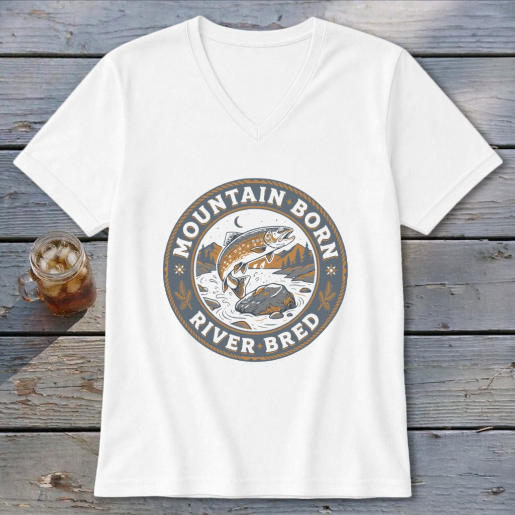 White t-shirt with circular graphic of fish jumping from river, text "Mountain Born River Bred".