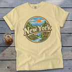 Yellow t-shirt with a circular graphic featuring the text "New York" and a scenic landscape.