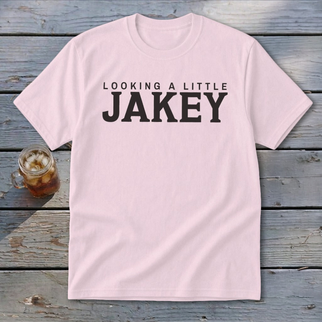 Pink t-shirt with "LOOKING A LITTLE JAKEY" text in black.