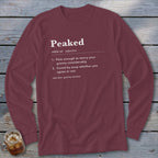 Maroon long-sleeve shirt with "Peaked" definition printed in white text.
