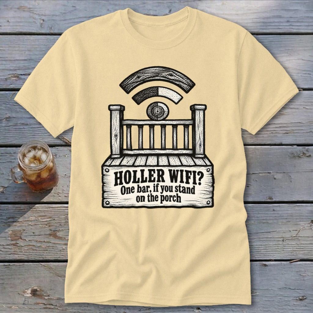 A cream-colored t-shirt with a black graphic of a porch and the text "HOLLER WIFI? One bar, if you stand on the porch".