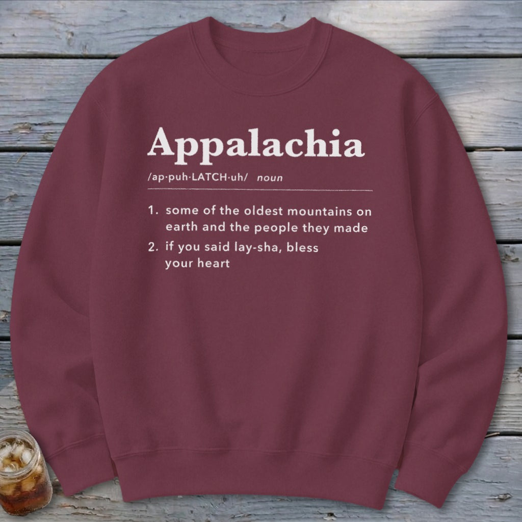 Maroon crewneck sweatshirt featuring a dictionary-style definition of Appalachia printed in white text on the chest.