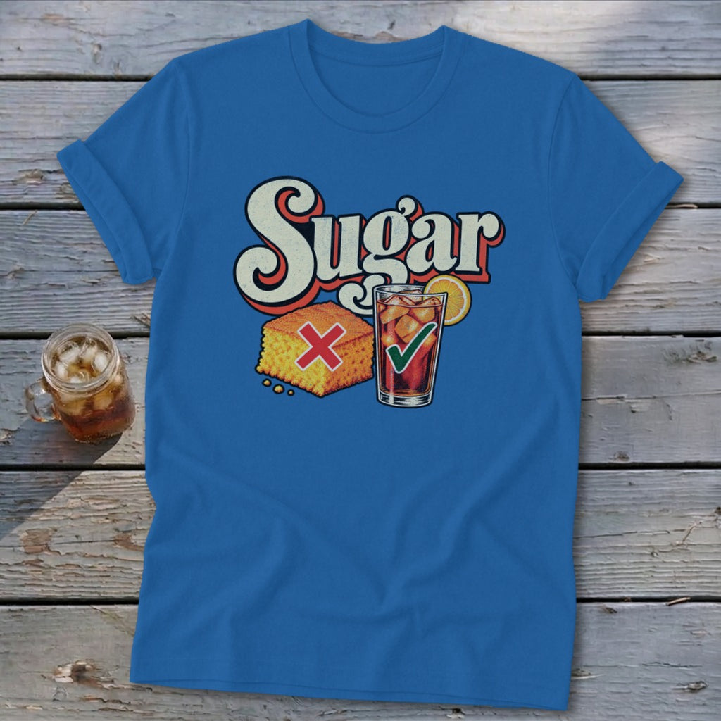 Royal blue t-shirt featuring a retro graphic of cornbread with a red X and iced tea with a green checkmark under the text Sugar.