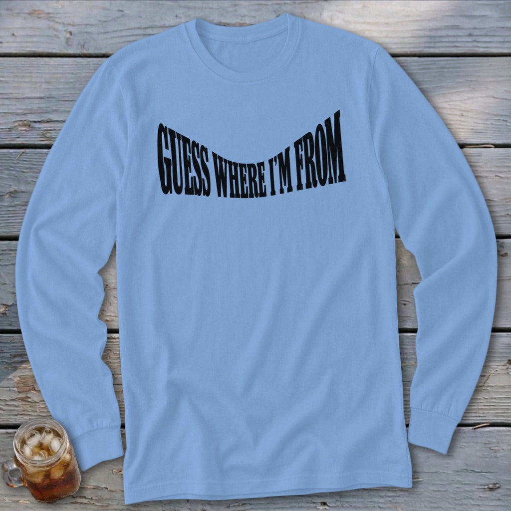 Light blue long sleeve shirt with black text that reads "GUESS WHERE I'M FROM".