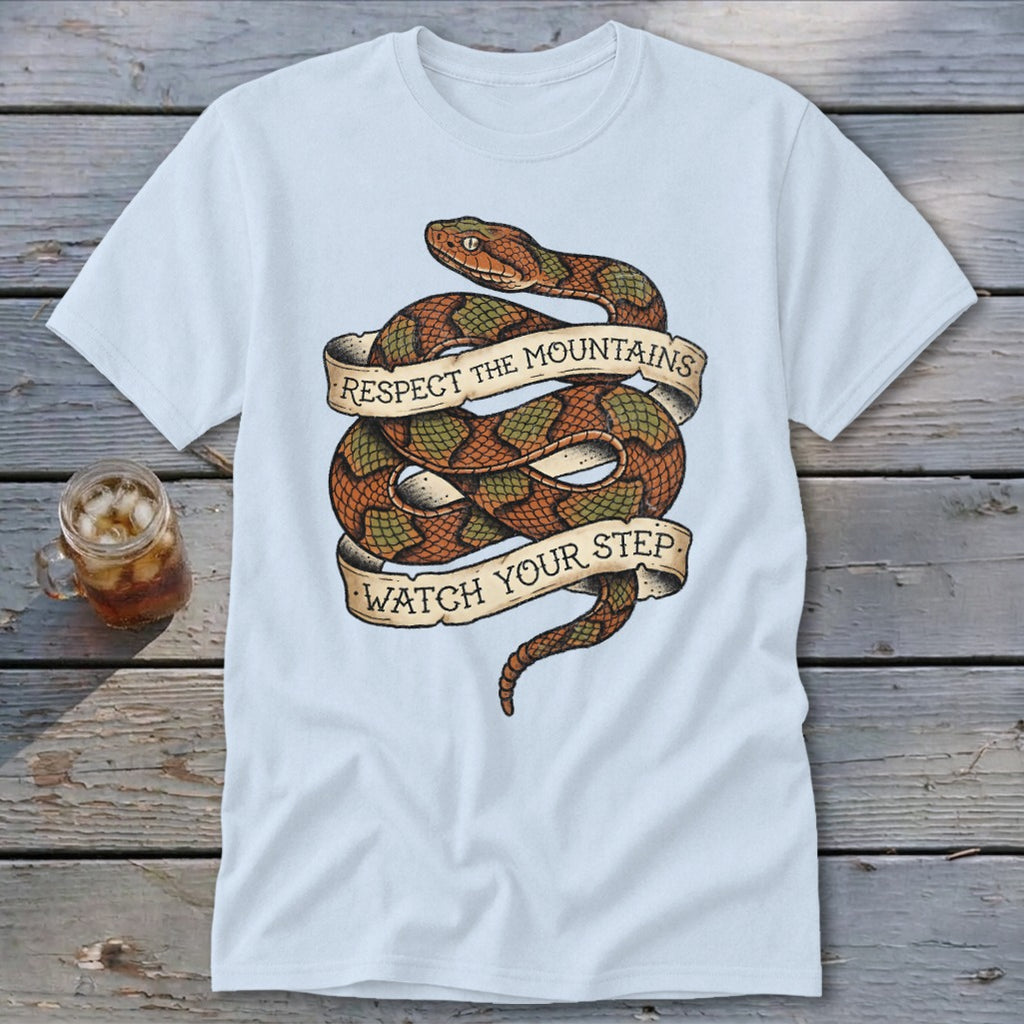 Light blue t-shirt with coiled snake and banners saying "RESPECT THE MOUNTAINS" and "WATCH YOUR STEP".