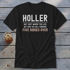 Black t-shirt with white text "HOLLER" and "NOT JUST WHERE YOU LIVE BUT HOW YOU CALL SOMEONE FIVE RIDGES OVER".