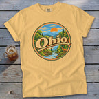 Yellow t-shirt with a circular graphic of a deer, river, and mountains with "Ohio" text.