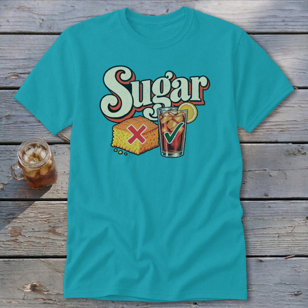 A teal t-shirt featuring a retro graphic with the word Sugar, cornbread with a red X, and iced tea with a green checkmark.