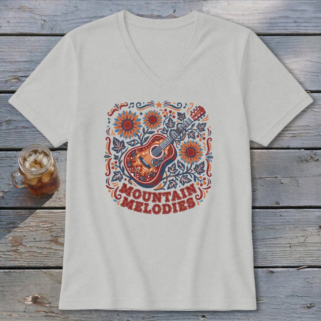 Light gray V-neck t-shirt featuring a colorful acoustic guitar graphic surrounded by flowers and Mountain Melodies text.
