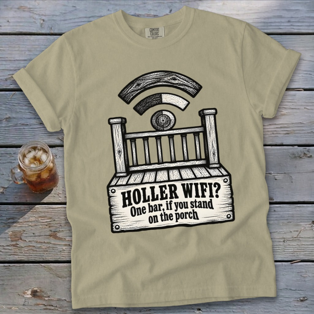 Tan t-shirt with a graphic of a porch, Wi-Fi signal, and text reading Holler Wifi? One bar, if you stand on the porch.