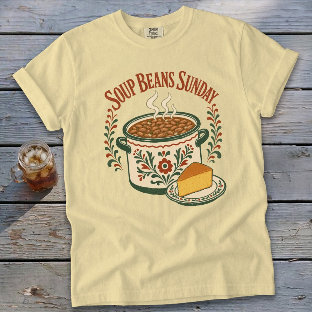 Yellow t-shirt with "Soup Beans Sunday" text, a pot of beans, and cornbread.