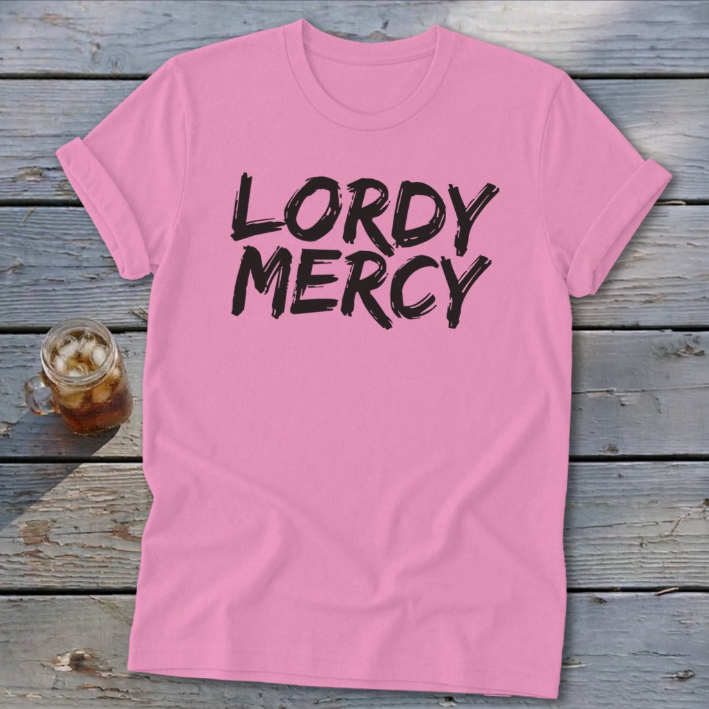 Pink t-shirt with black "LORDY MERCY" text and a glass of iced drink.
