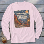 Long-sleeved shirt with vintage autumn mountain scene and text "Took the long way home for October."