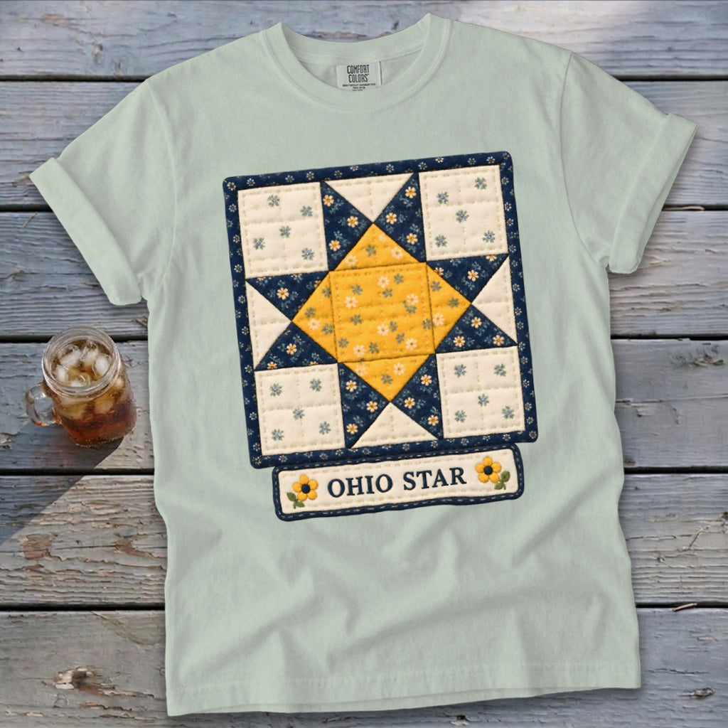 Light blue t-shirt with "Ohio Star" quilt design and sunflowers.