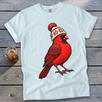 Light blue t-shirt featuring an illustration of a red cardinal wearing a winter beanie.