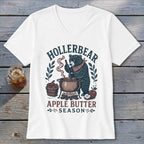 Bear making apple butter with "Hollerbear Apple Butter Season" text.