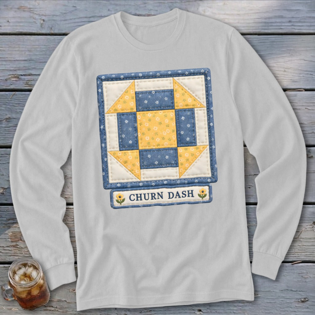 Long sleeve white t-shirt with a blue and yellow quilt block and "CHURN DASH" text.