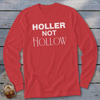 Red long sleeve shirt with white text "Holler Not Hollow".