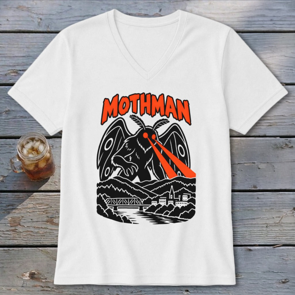 White t-shirt with Mothman graphic, red eyes, and town scene.