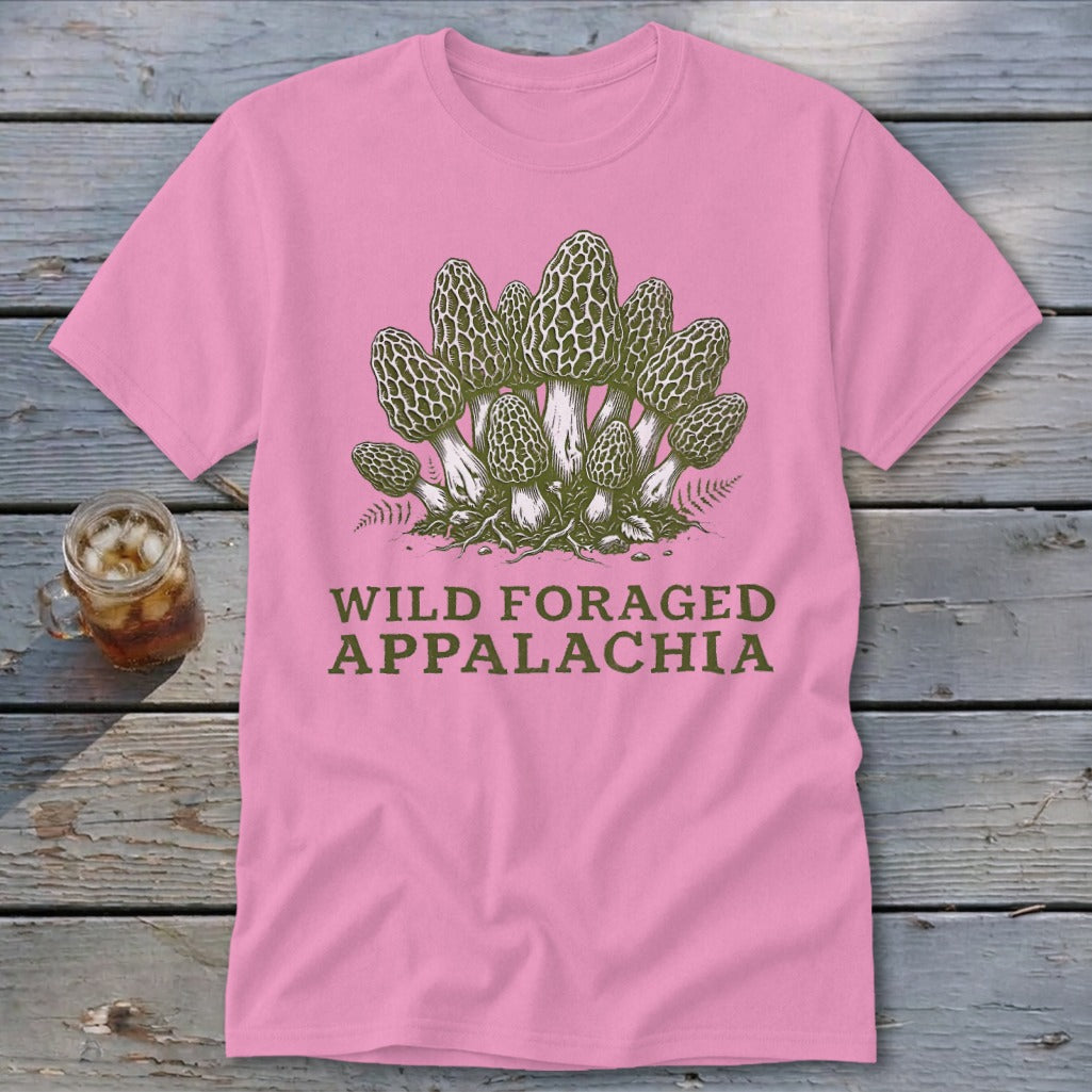 Pink t-shirt with a graphic of morel mushrooms and text that reads "Wild Foraged Appalachia".