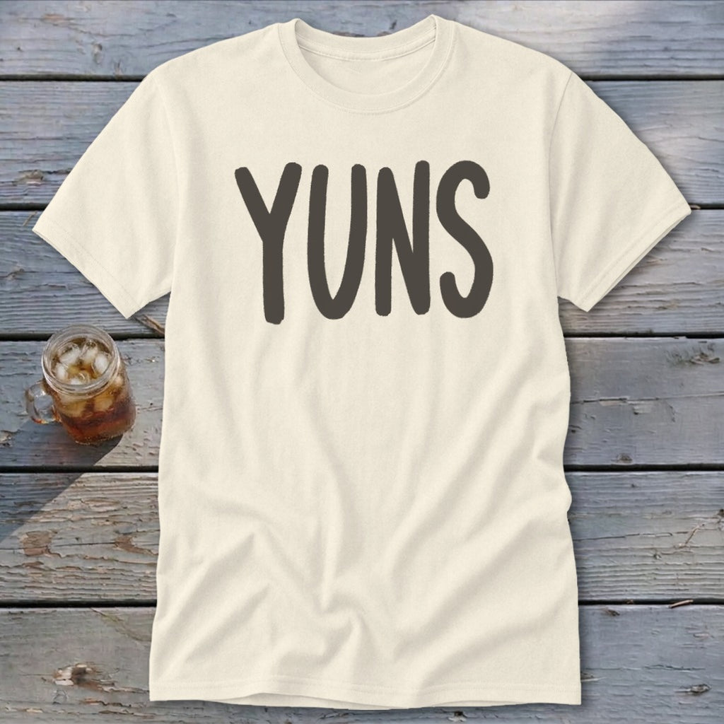 Cream t-shirt with "YUNS" in dark gray lettering and a glass of iced tea.