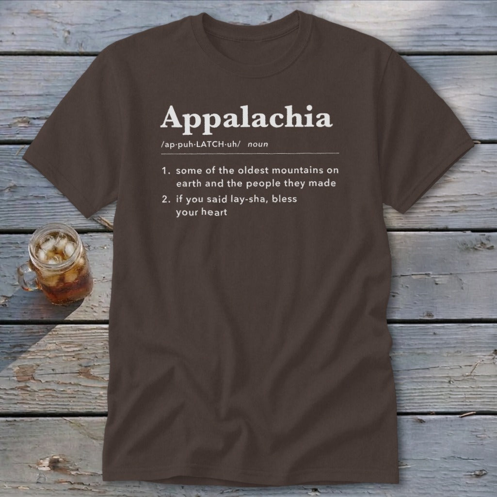 Brown t-shirt featuring dictionary-style text defining Appalachia with phonetic spelling and two humorous definitions.