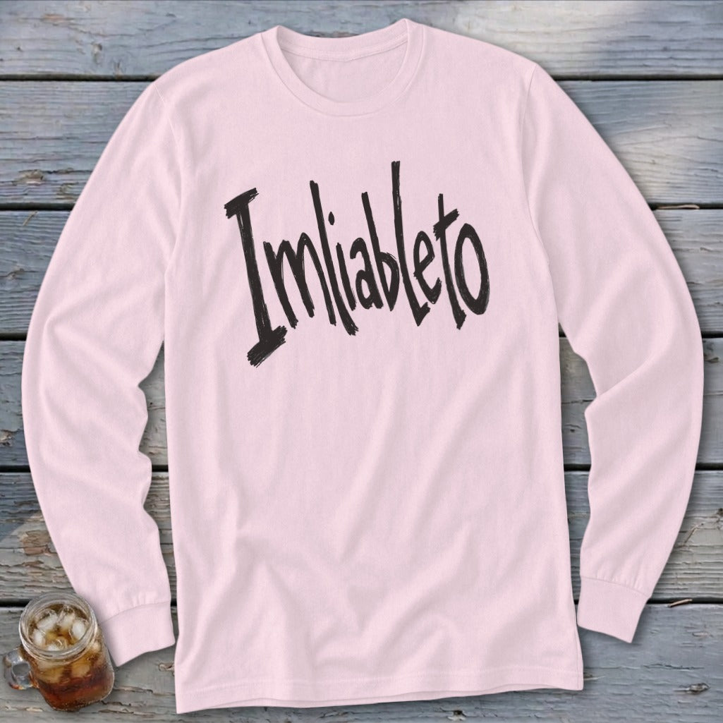 Pink long-sleeve shirt with black "Imliableto" text.
