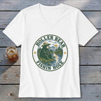 White t-shirt with a circular graphic of a bear fishing. Text reads "HOLLER BEAR" and "FISHIN HOLE".
