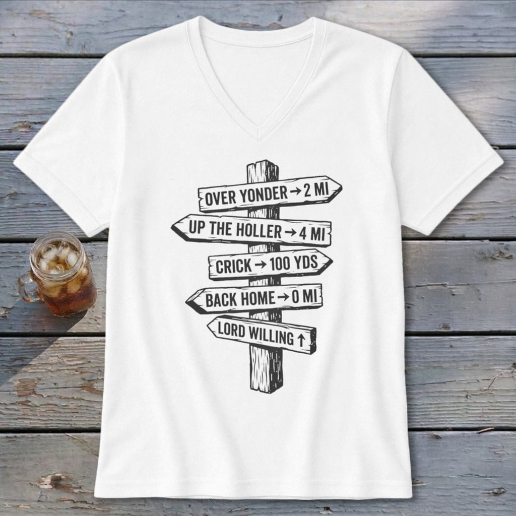 A white V-neck t-shirt featuring a rustic wooden directional sign graphic with humorous southern text.