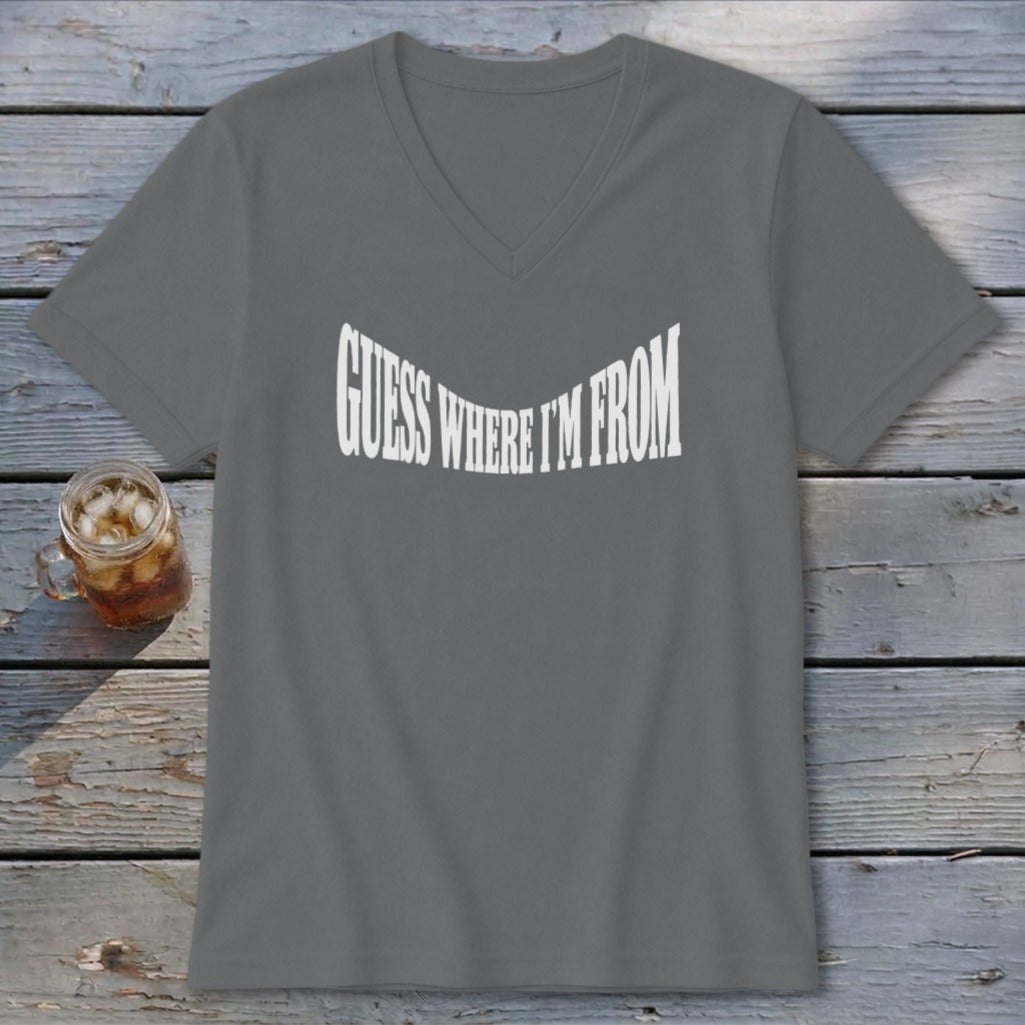 Grey v-neck t-shirt with white text reading "GUESS WHERE I'M FROM".