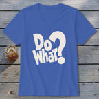 A royal blue V-neck T-shirt with the white text "Do what?" laid flat on a wooden surface.