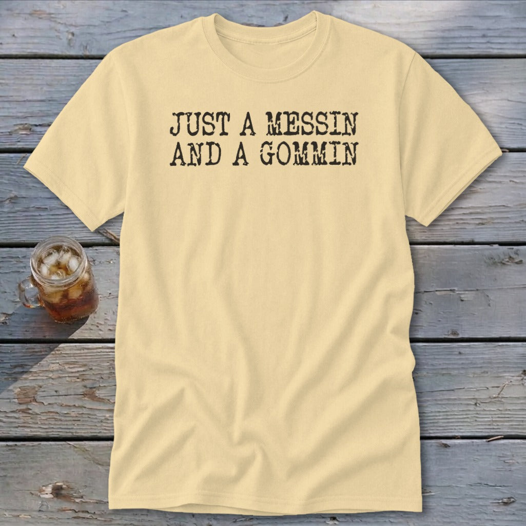 Cream t-shirt with black text that reads "JUST A MESSIN AND A GOMMIN".