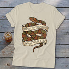 Cream t-shirt with coiled snake and banners reading "Respect the Mountains" and "Watch Your Step".