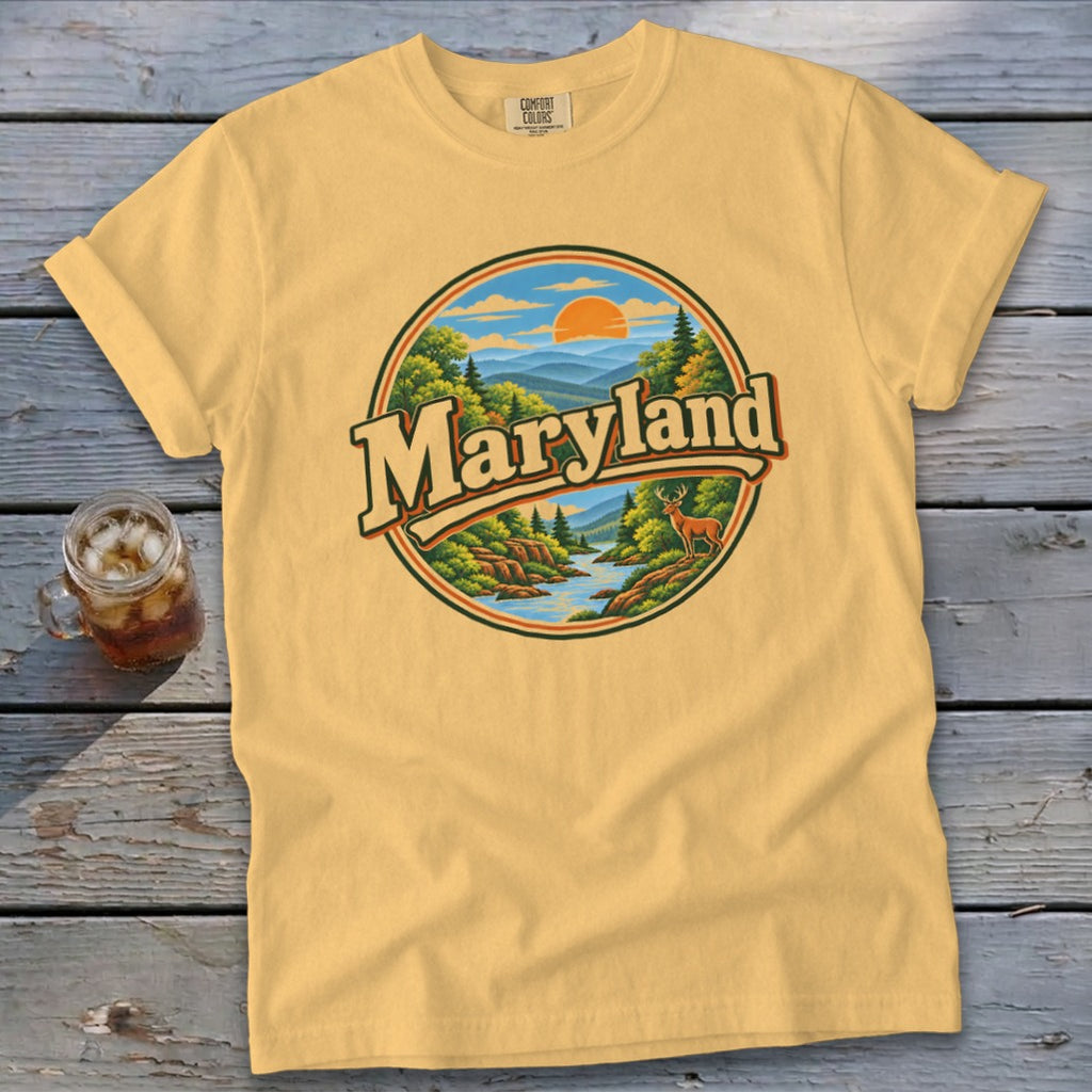 Yellow t-shirt featuring a circular graphic with "Maryland" text, mountains, a river, and a deer.