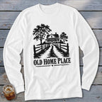 White long sleeve shirt with black graphic of a house, trees, fence, and text "OLD HOME PLACE".