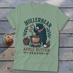 Bear making apple butter with text "HOLLERBEAR APPLE BUTTER SEASON".