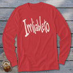 Red long-sleeve shirt with "Imliableto" in distressed white lettering.
