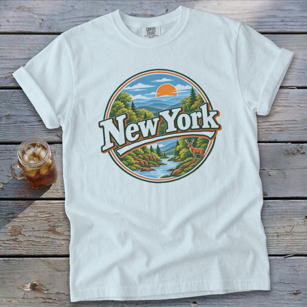 White t-shirt with circular New York landscape graphic and deer.