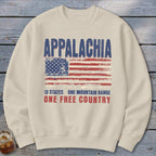 Beige crewneck sweatshirt featuring a distressed American flag graphic and the text Appalachia, 13 States, One Mountain Range, One Free Country.